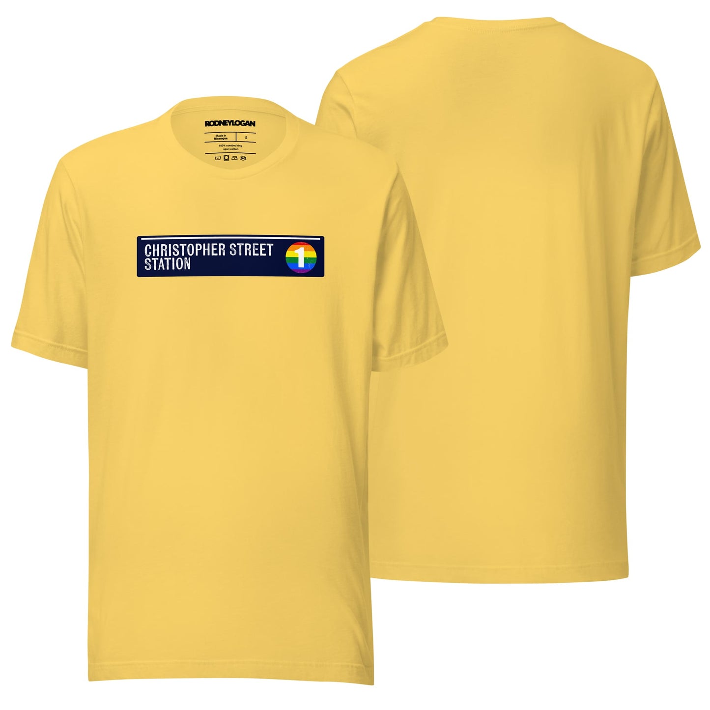 A sunny yellow crewneck T-shirt with the "Christopher Street Station" text printed on the front. The shirt is styled flat, with its bright, cheerful color standing out against the neutral background.